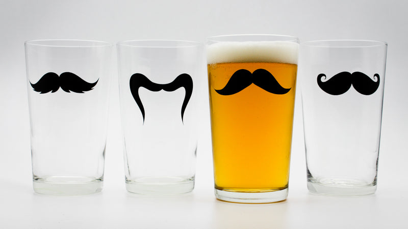 set of draft glasses with black moustache prints