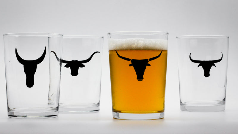 set of draft glasses with black nguni skull prints
